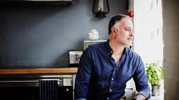 Senior man thinking looking out of window