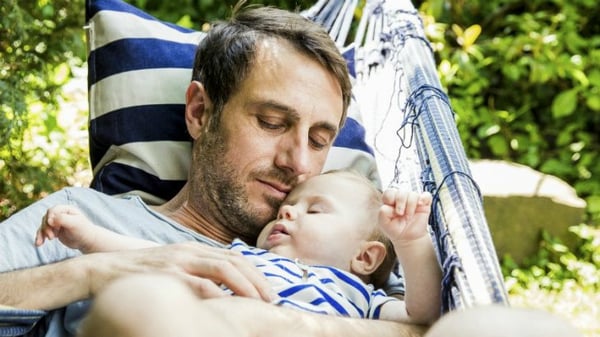 life cover - resources - img - Sleep tips for parents - father and son in hammock - 730x411
