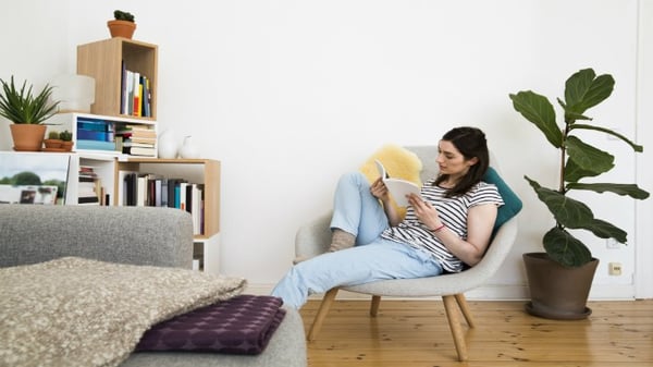 life cover - resources - img - finding lost life insurance - woman reading policy - 730x411