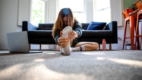 woman stretching exercise at home