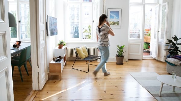 woman walking around the house