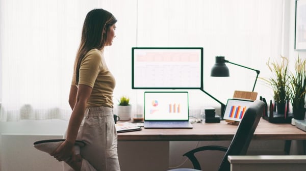woman exercising at desk
