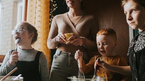 Children cooking with adults