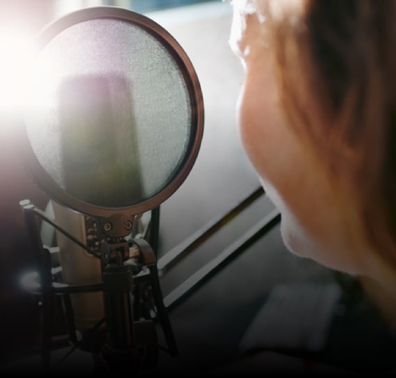 Person using a magnifying glass
