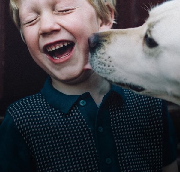kid with dog