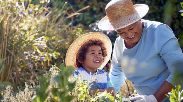 Grandmother and child gardening