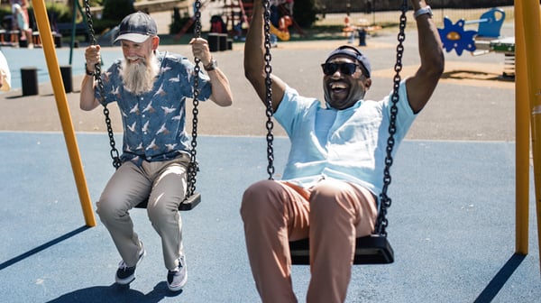 Men on swings