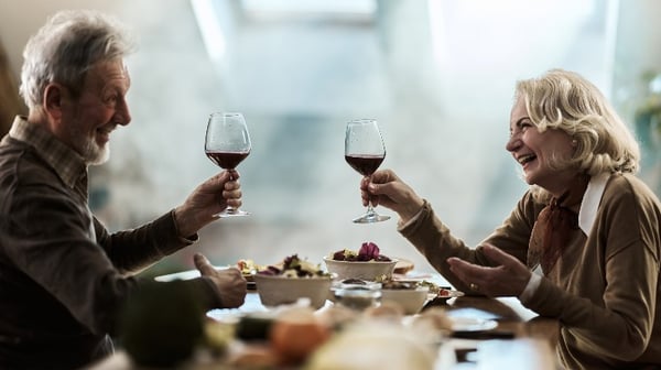 image of a man and woman drinking wine on a date